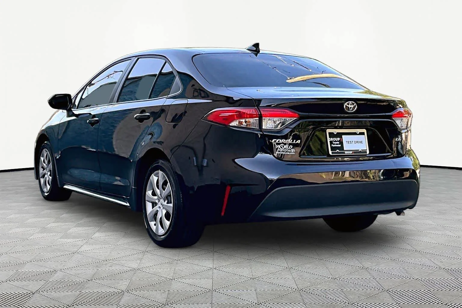 Used 2025 Midnight Black Metallic Toyota LE image 23