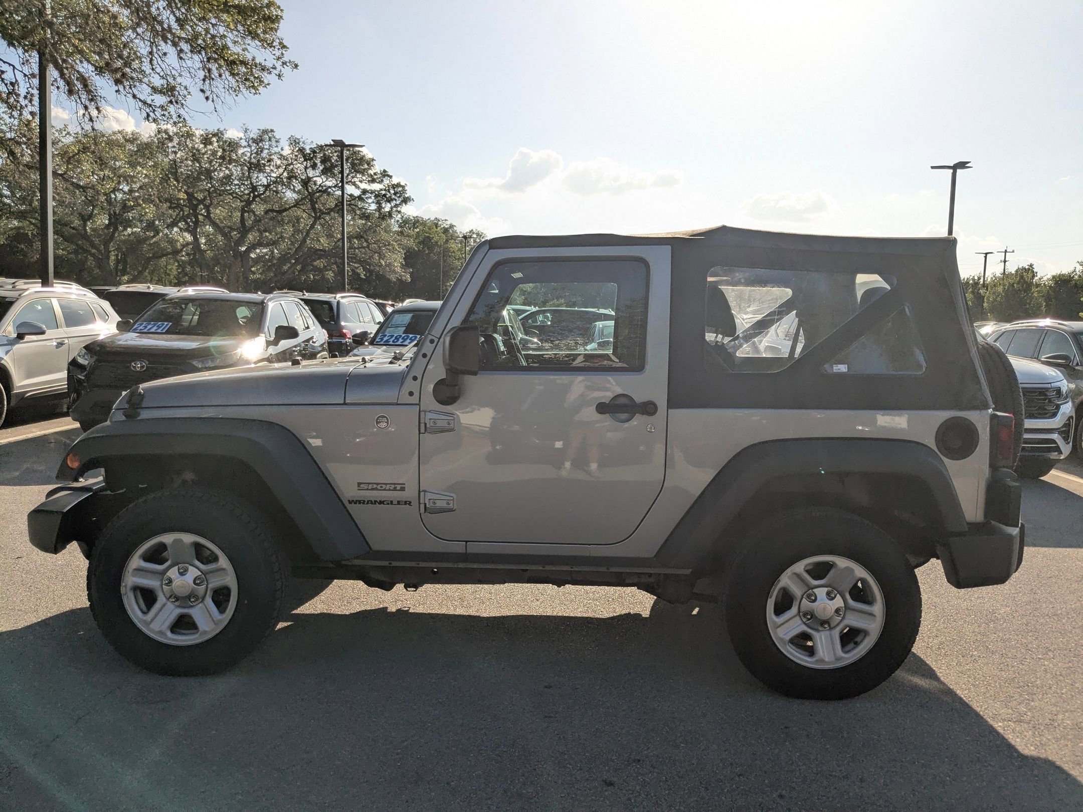 Used 2015 Billet Silver Metallic Clearcoat Jeep Sport image 6