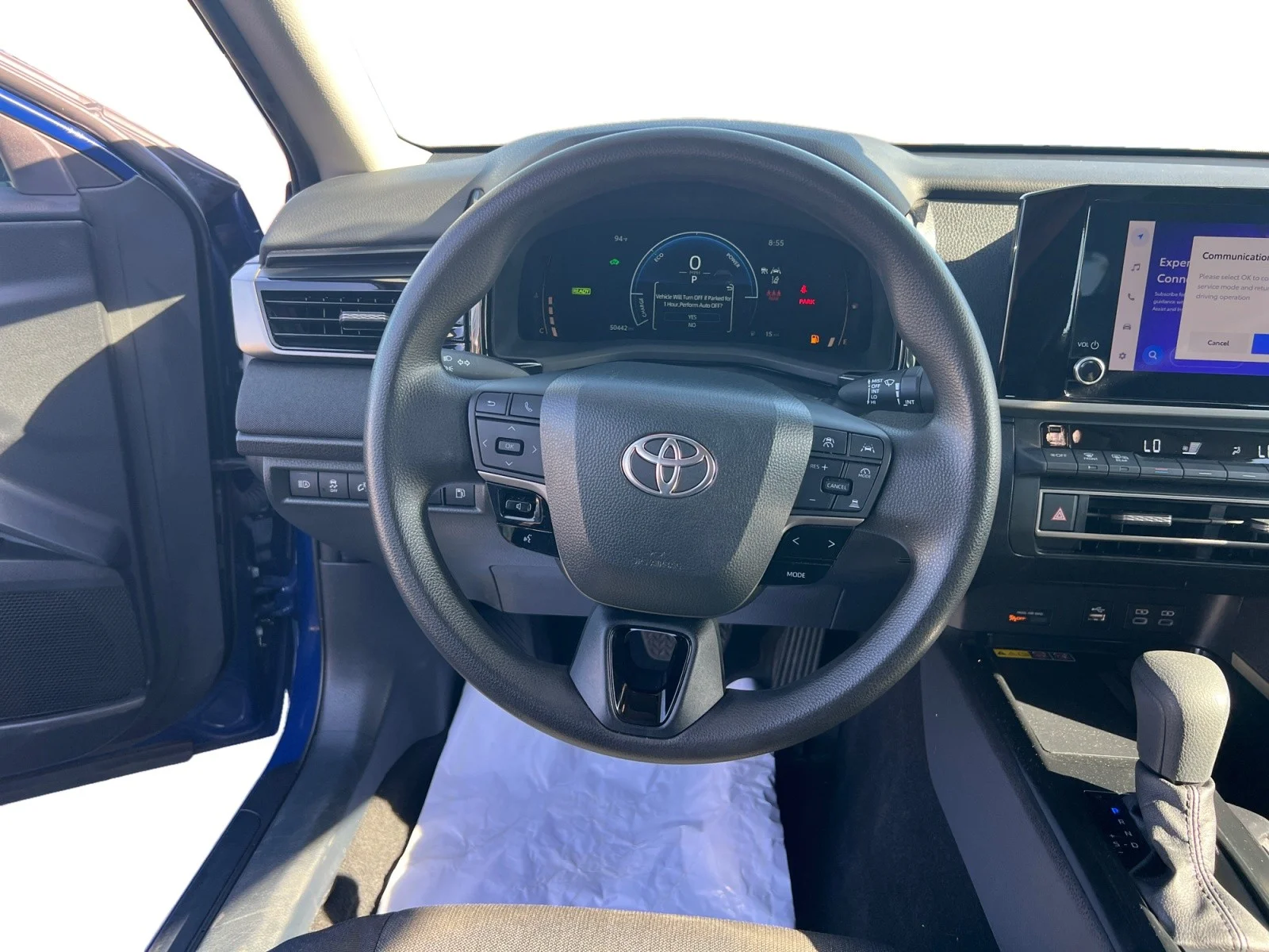Used 2025 Reservoir Blue Toyota LE image 11