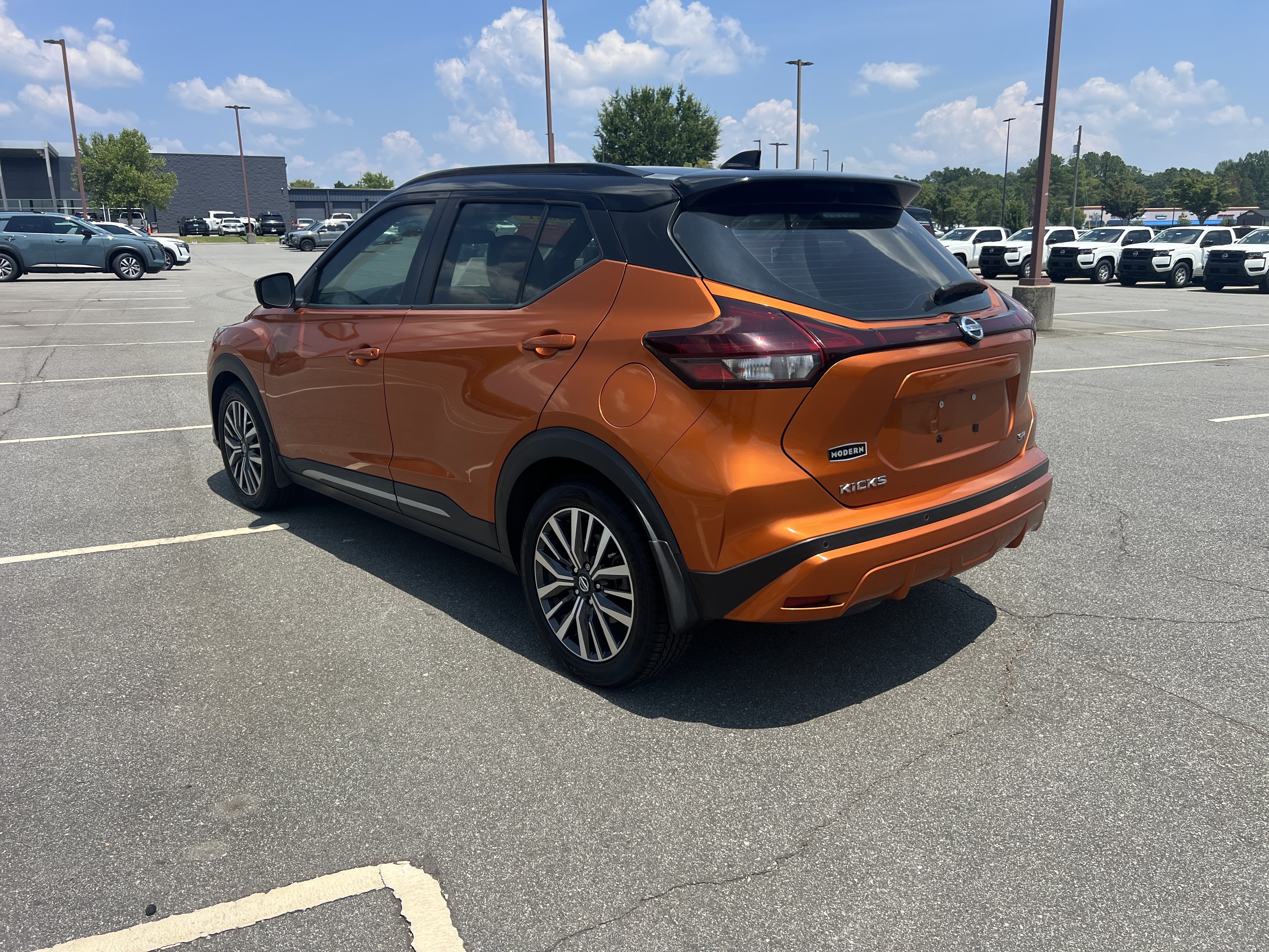 Certified Used 2021 Monarch Orange/Super Black Nissan SR image 7