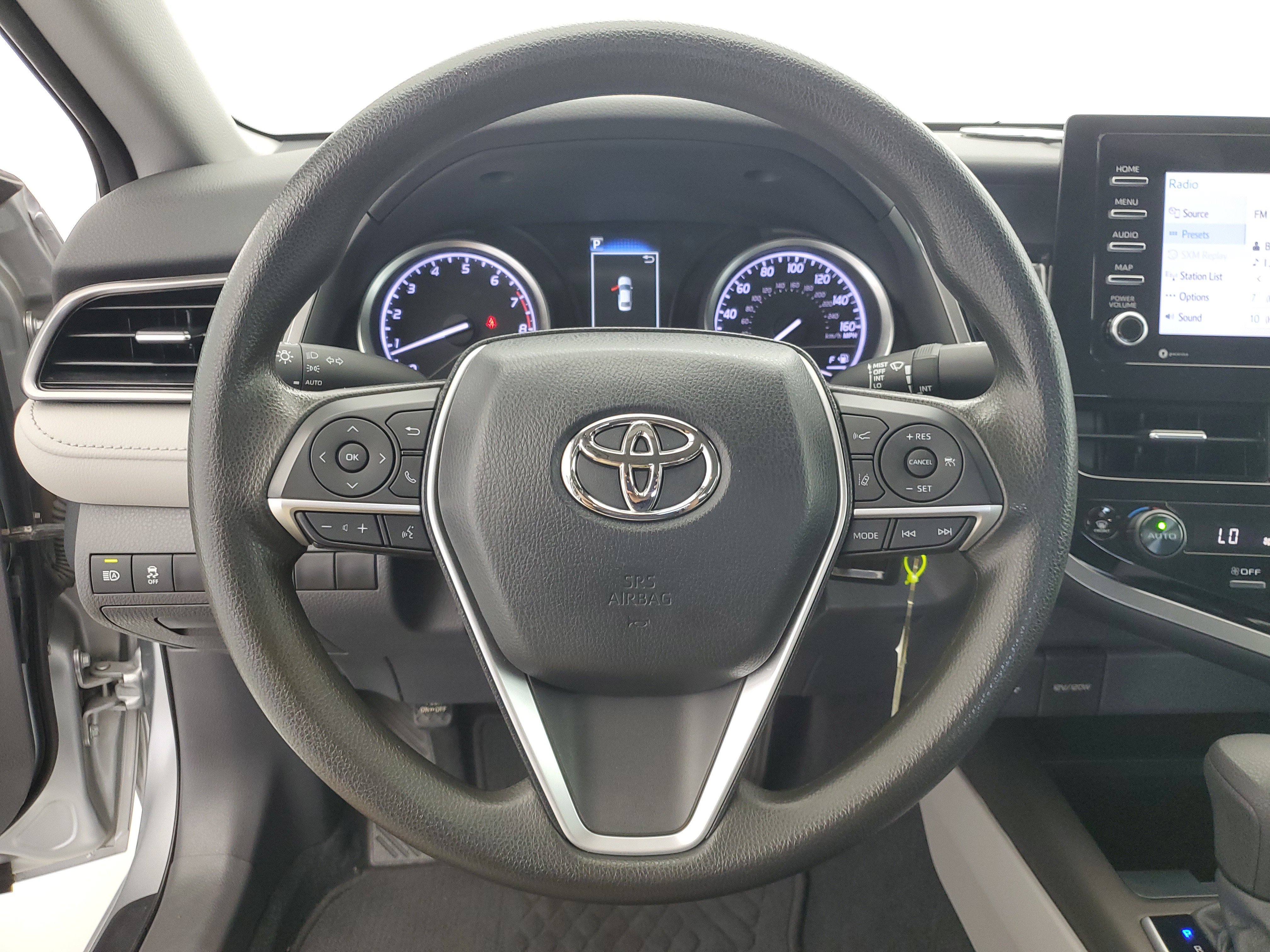 Used 2022 Celestial Silver Metallic Toyota LE image 21