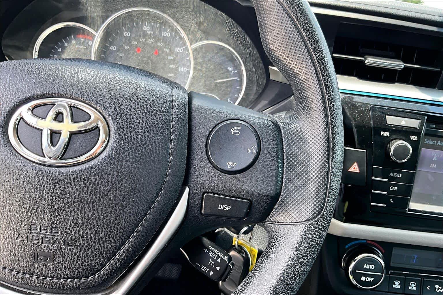 Used 2016 Classic Silver Metallic Toyota LE image 22