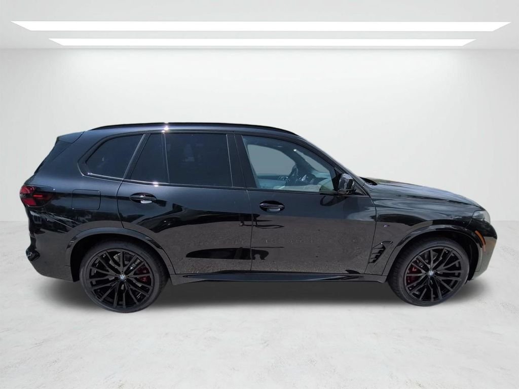 New 2026 Black Sapphire Metallic BMW M60i image 3