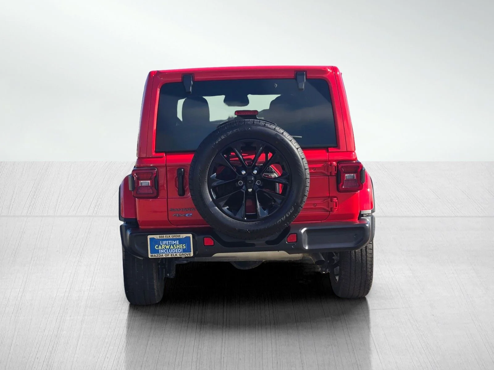 Used 2025 Firecracker Red Clearcoat Jeep Sahara 4xe image 5