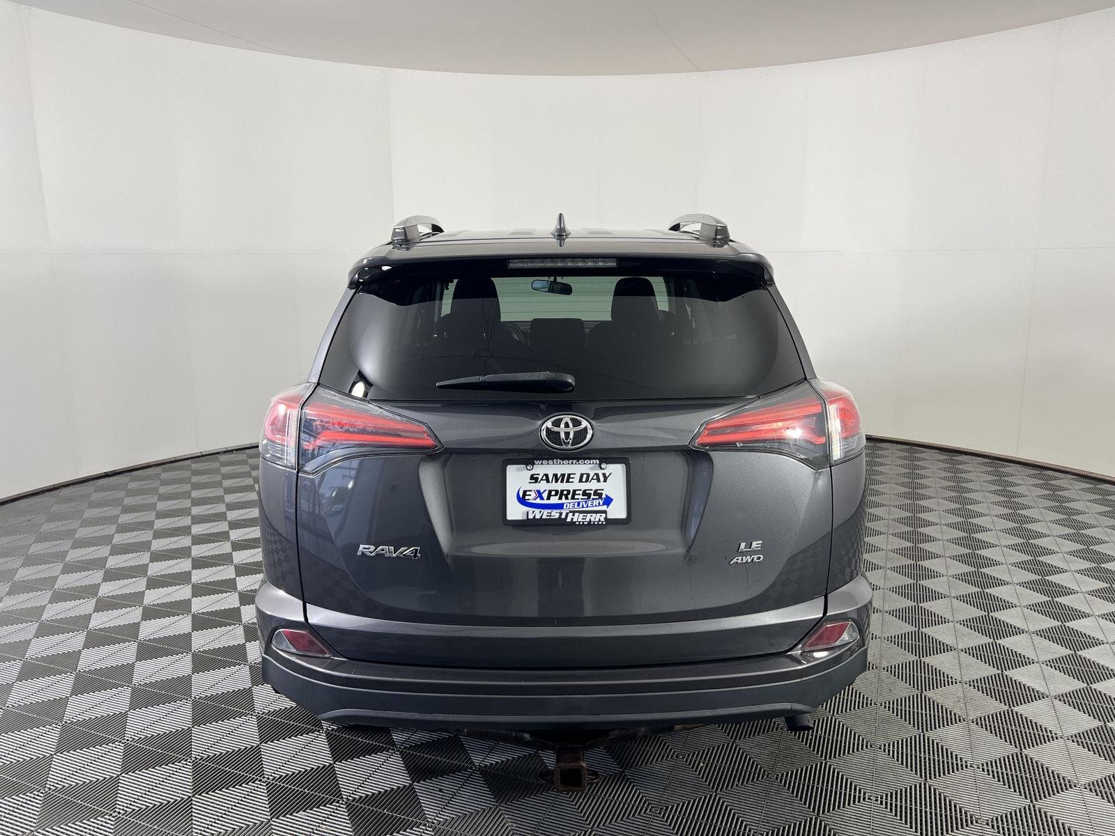 Used 2016 Magnetic Gray Metallic Toyota LE image 10