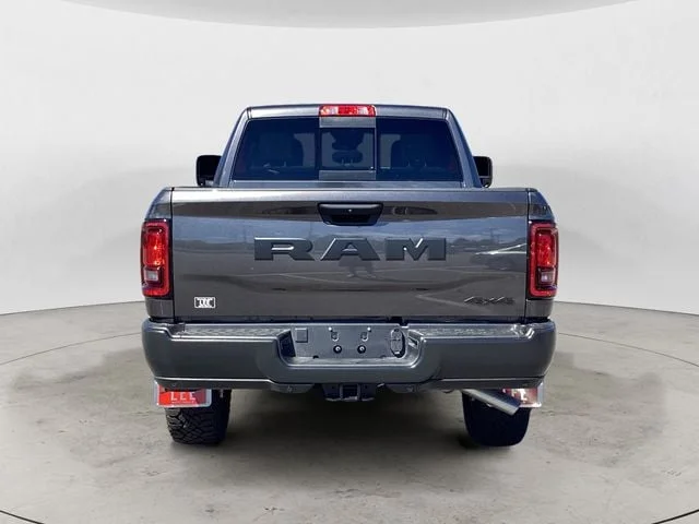 New 2026 Crystal Metallic Ram WARLOCK CREW CAB 4X4 6