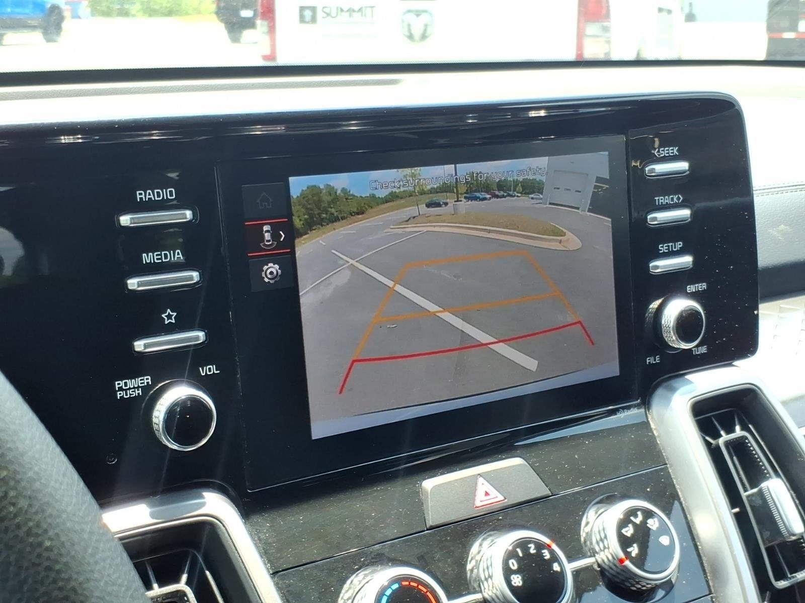 Used 2023 Glacial White Pearl Kia LX image 21