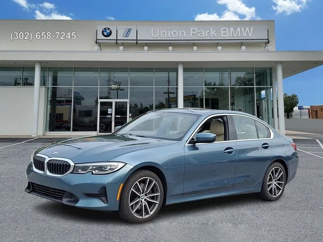 Used 2021 Blue Ridge Mountain Metallic BMW 330i xDrive image 1