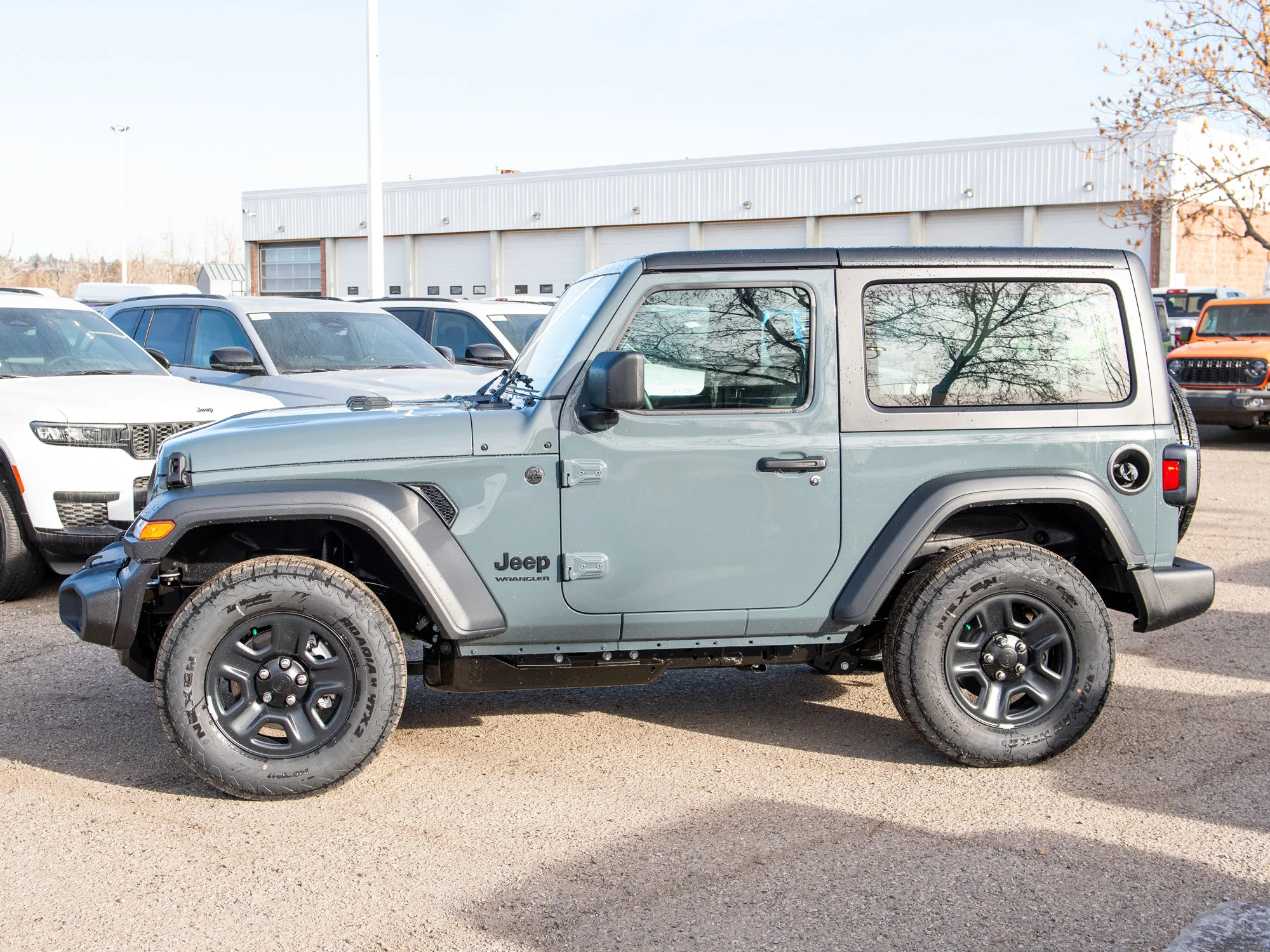 New 2026 Dark blue Jeep Sport* image 2