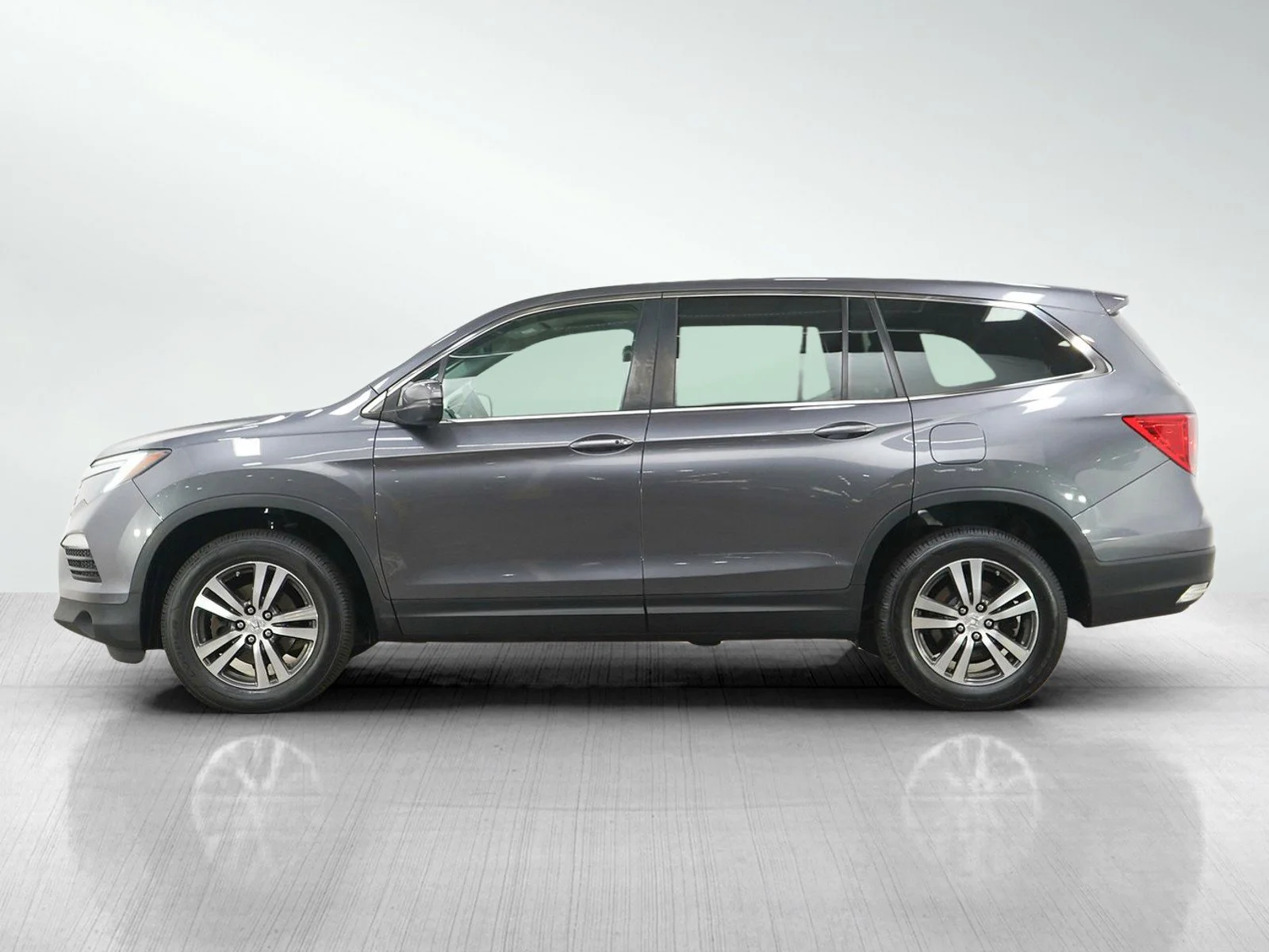Used 2016 Honda Pilot EX-L with VIN 5FNYF6H58GB073259 for sale in Burnsville, Minnesota