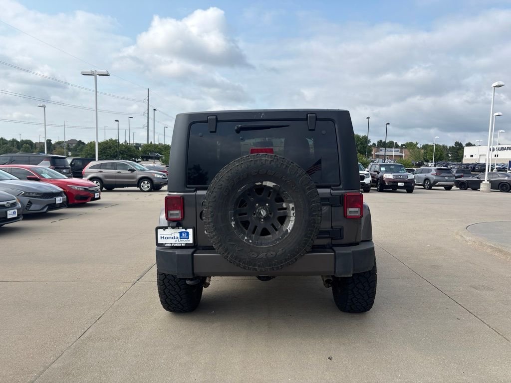 Used 2017 Granite Crystal Metallic Clearcoat Jeep Sahara image 6