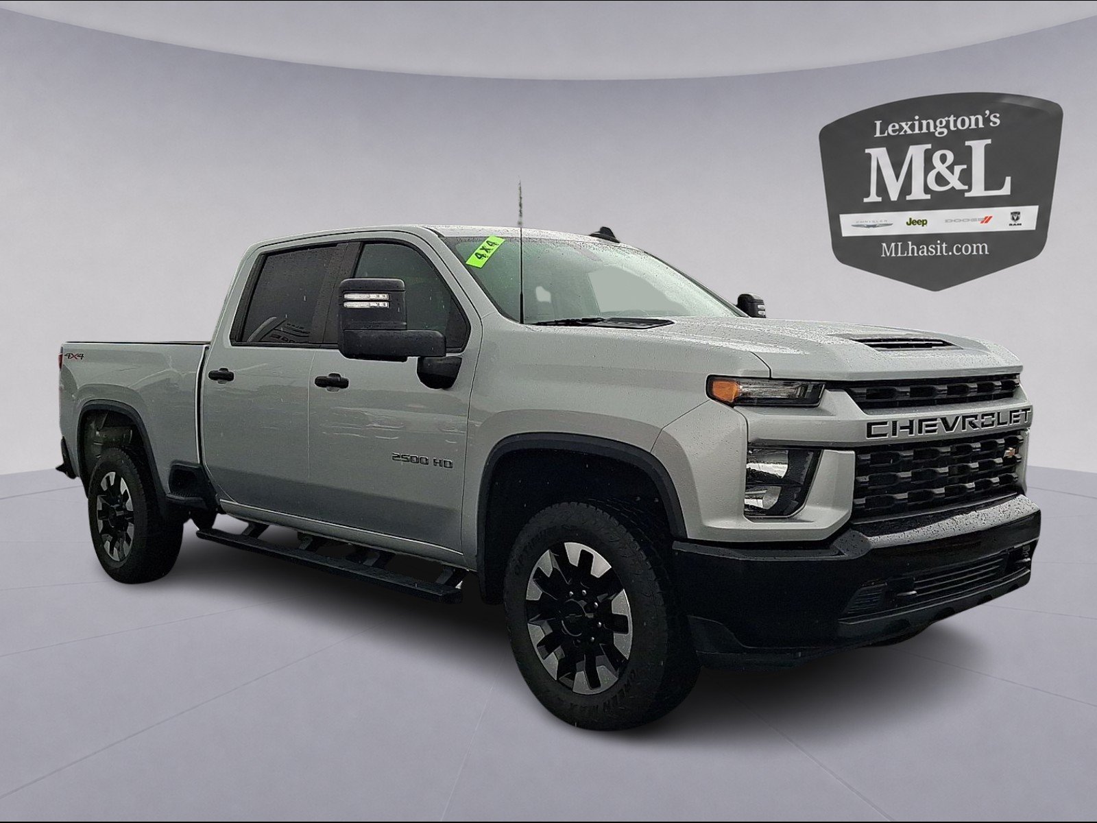 Used 2020 Silver Ice Metallic - GAN Chevrolet 4WD Crew Cab Standard Bed Custom image 1