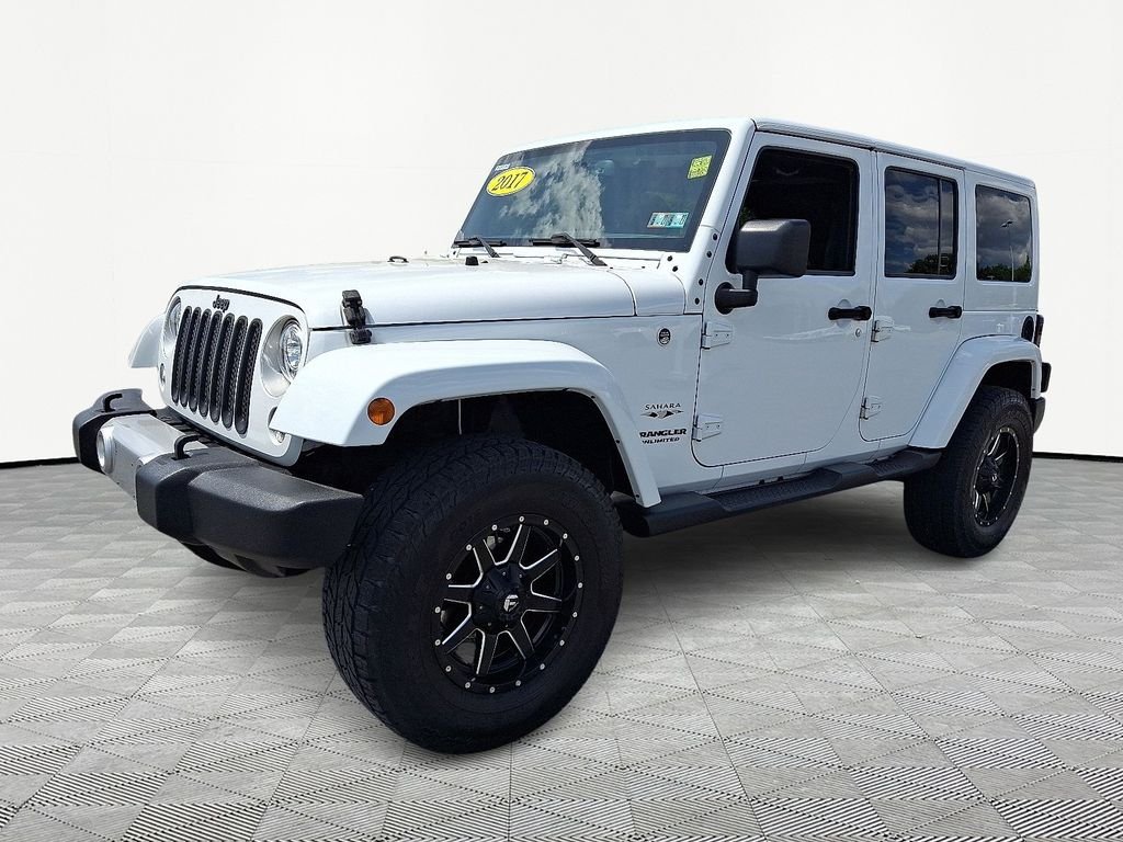 Used 2017 White Jeep Unlimited Sahara image 3