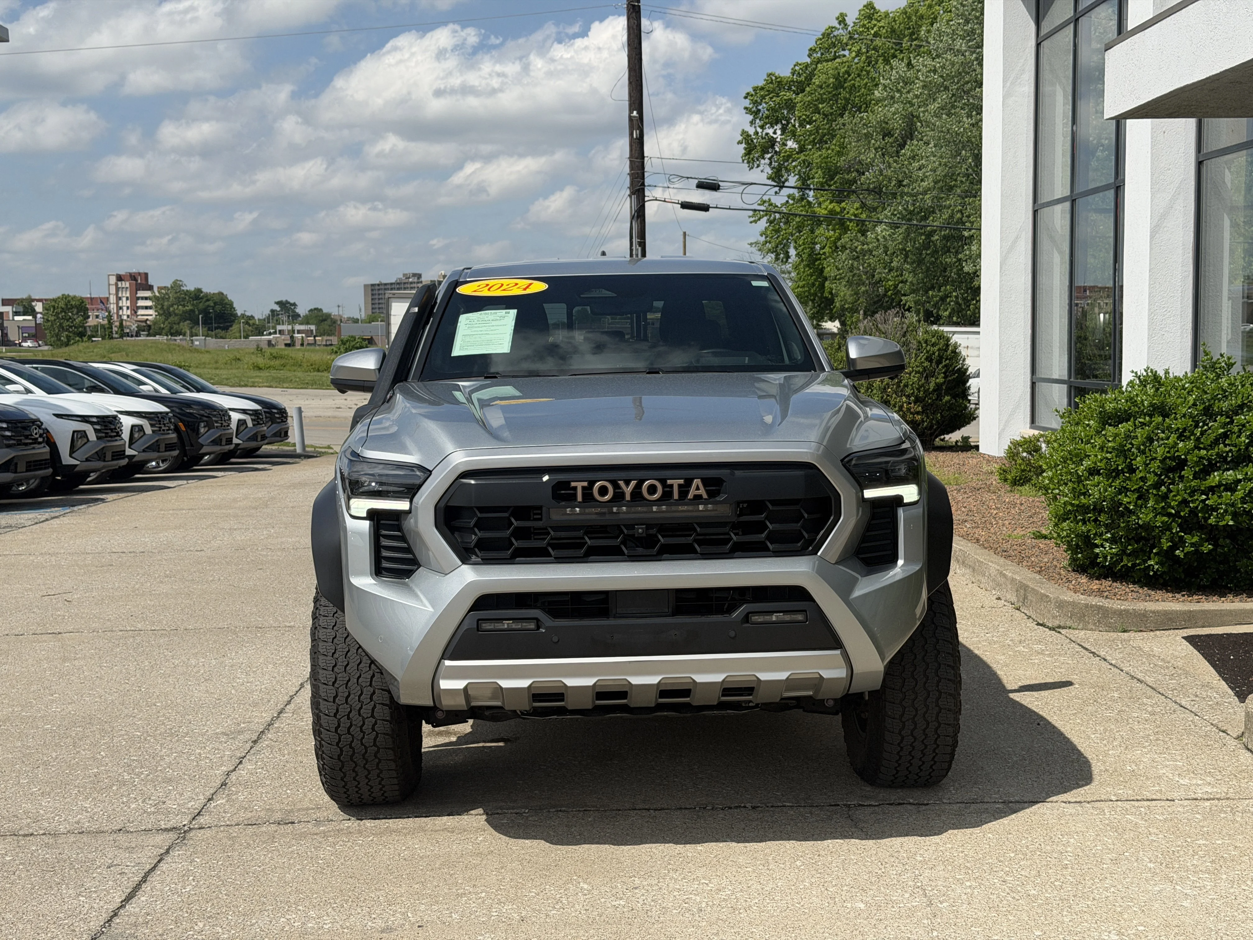 Used 2024 Celestial Silver Metallic Toyota Trailhunter Hybrid image 22