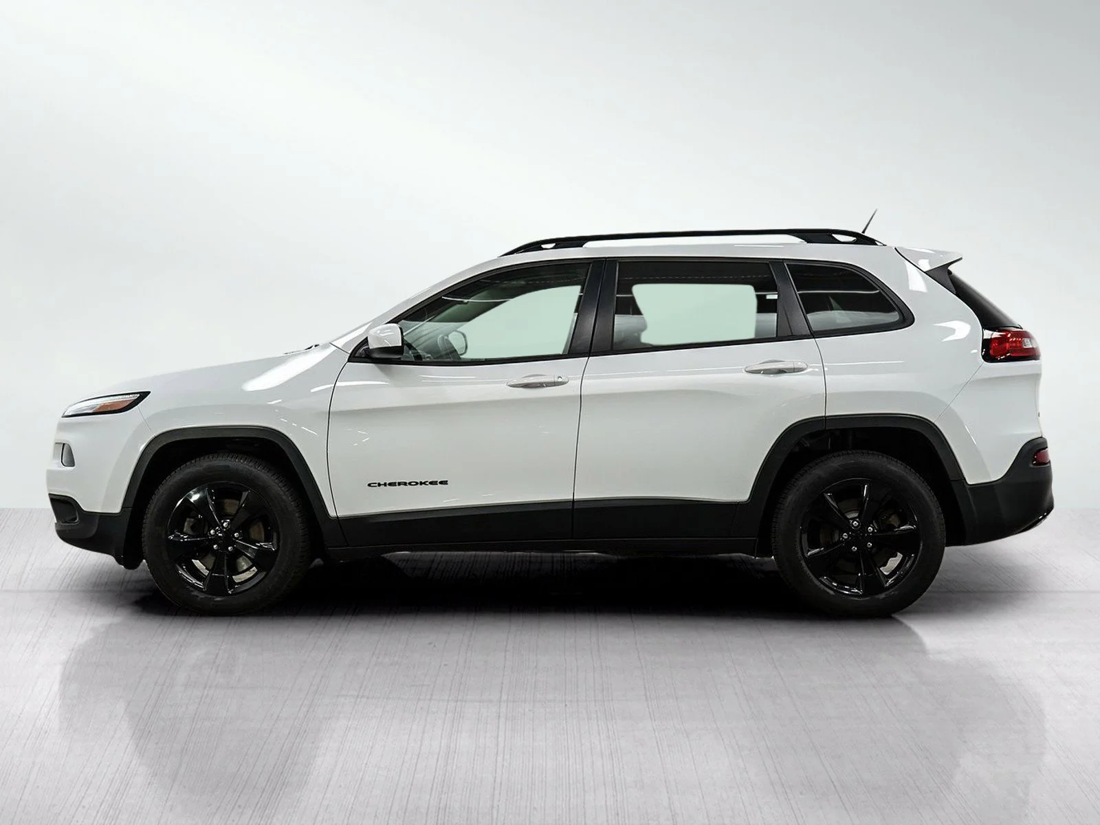 Used 2015 Jeep Cherokee Altitude with VIN 1C4PJMCS6FW727942 for sale in Hopkins, Minnesota