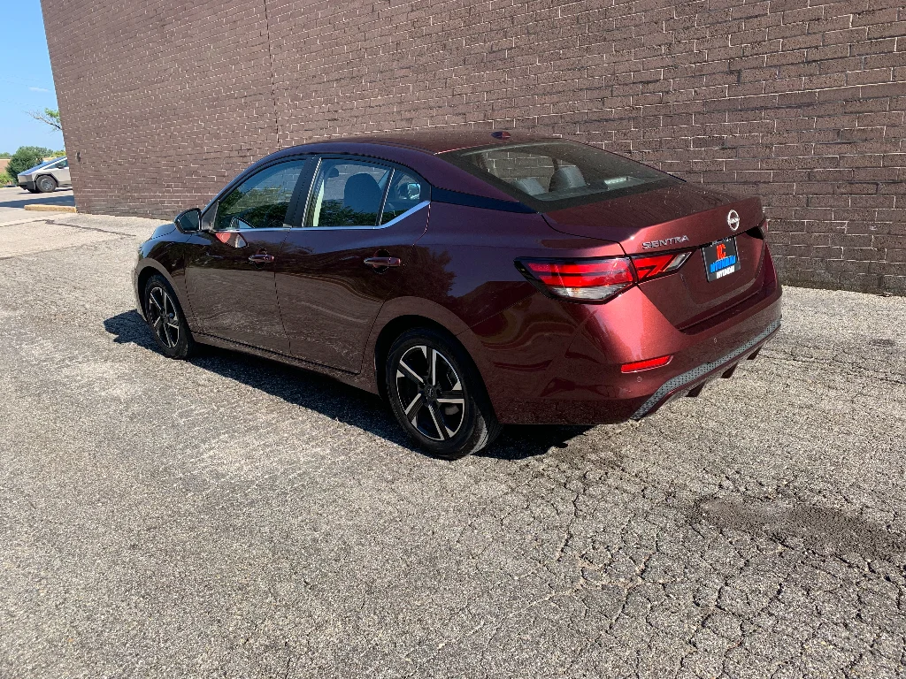 Used 2024 Rosewood Metallic Nissan SV image 3
