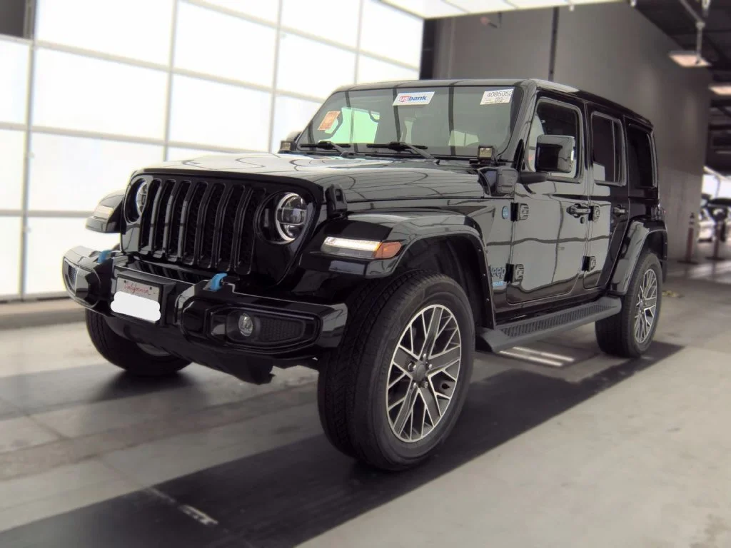 Used 2022 Black Jeep Unlimited Sahara 4xe image 1