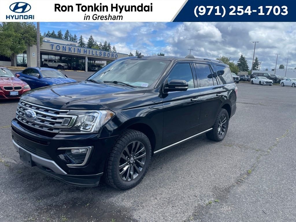 Used 2021 Agate Black Metallic Ford Limited image 1