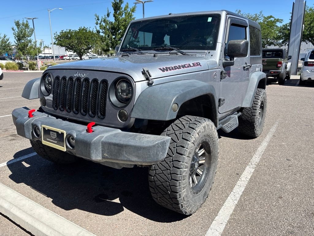 Used 2014 Gray Jeep Sport image 1