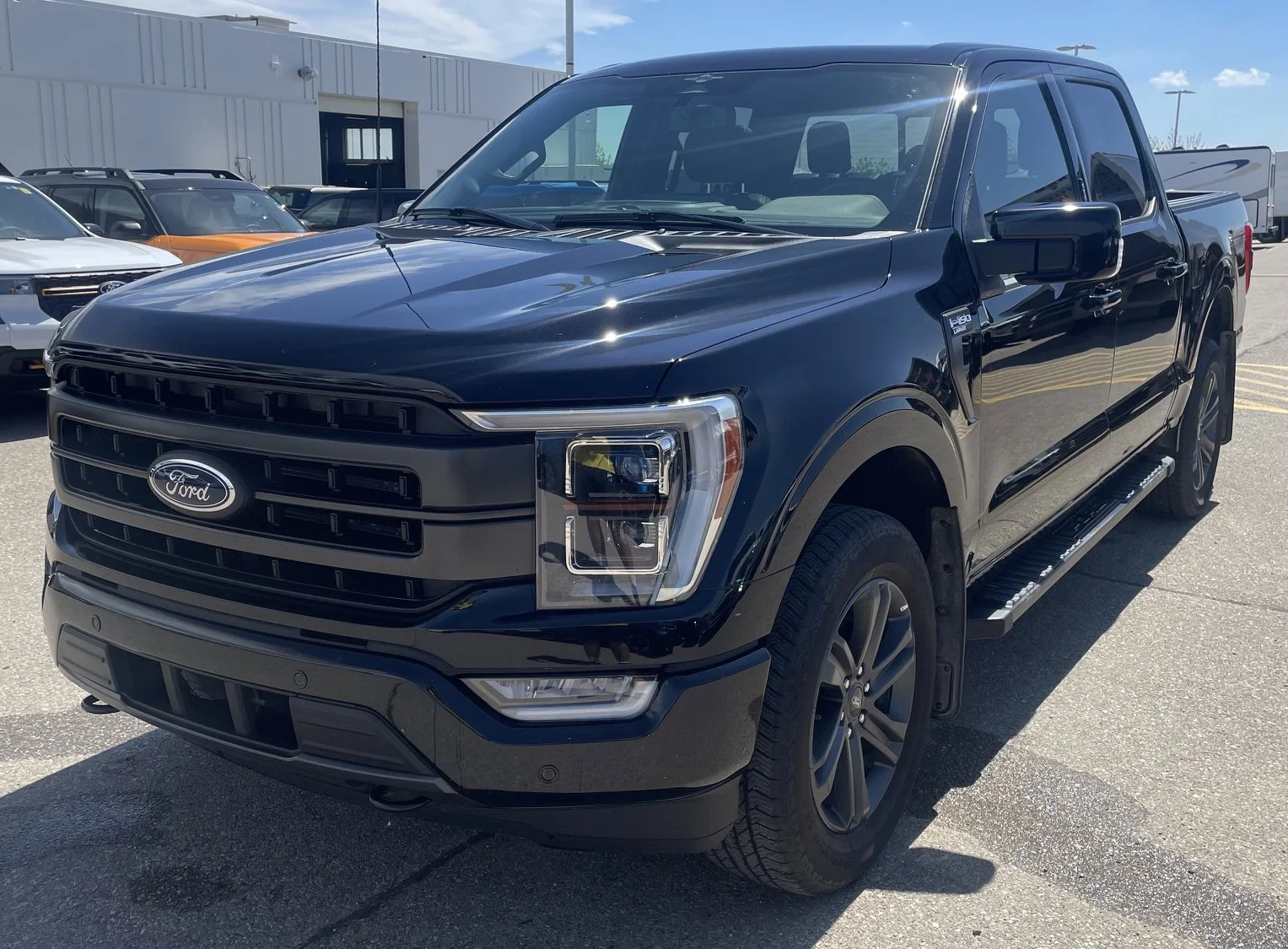 Used 2023 Black Ford LARIAT SuperCrew   **New Arrival** image 1