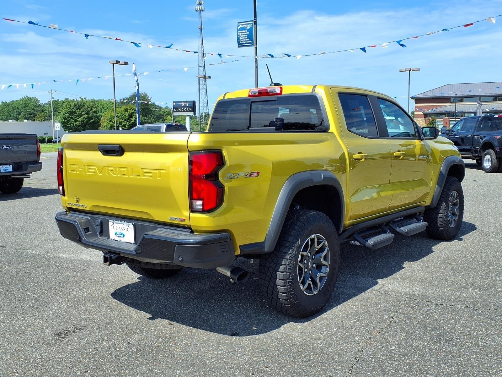 Certified Used 2023 Yellow Chevrolet 4WD ZR2 image 2