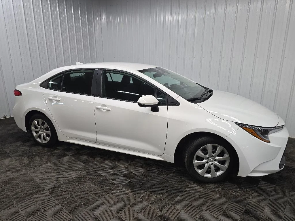 Used 2024 White Toyota LE image 1
