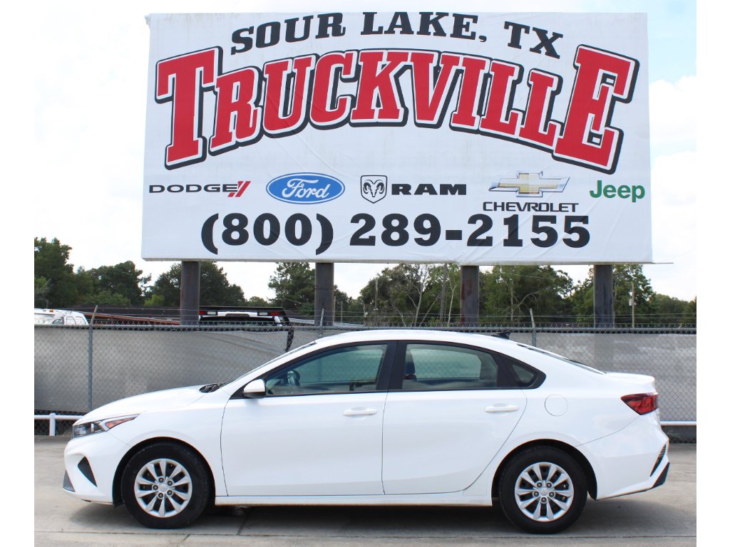 Used 2023 Clear White Kia LX image 1