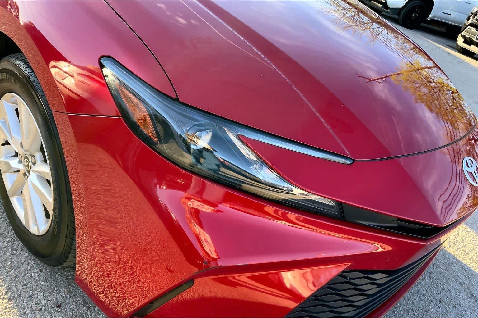 Used 2025 Supersonic Red Toyota LE image 27
