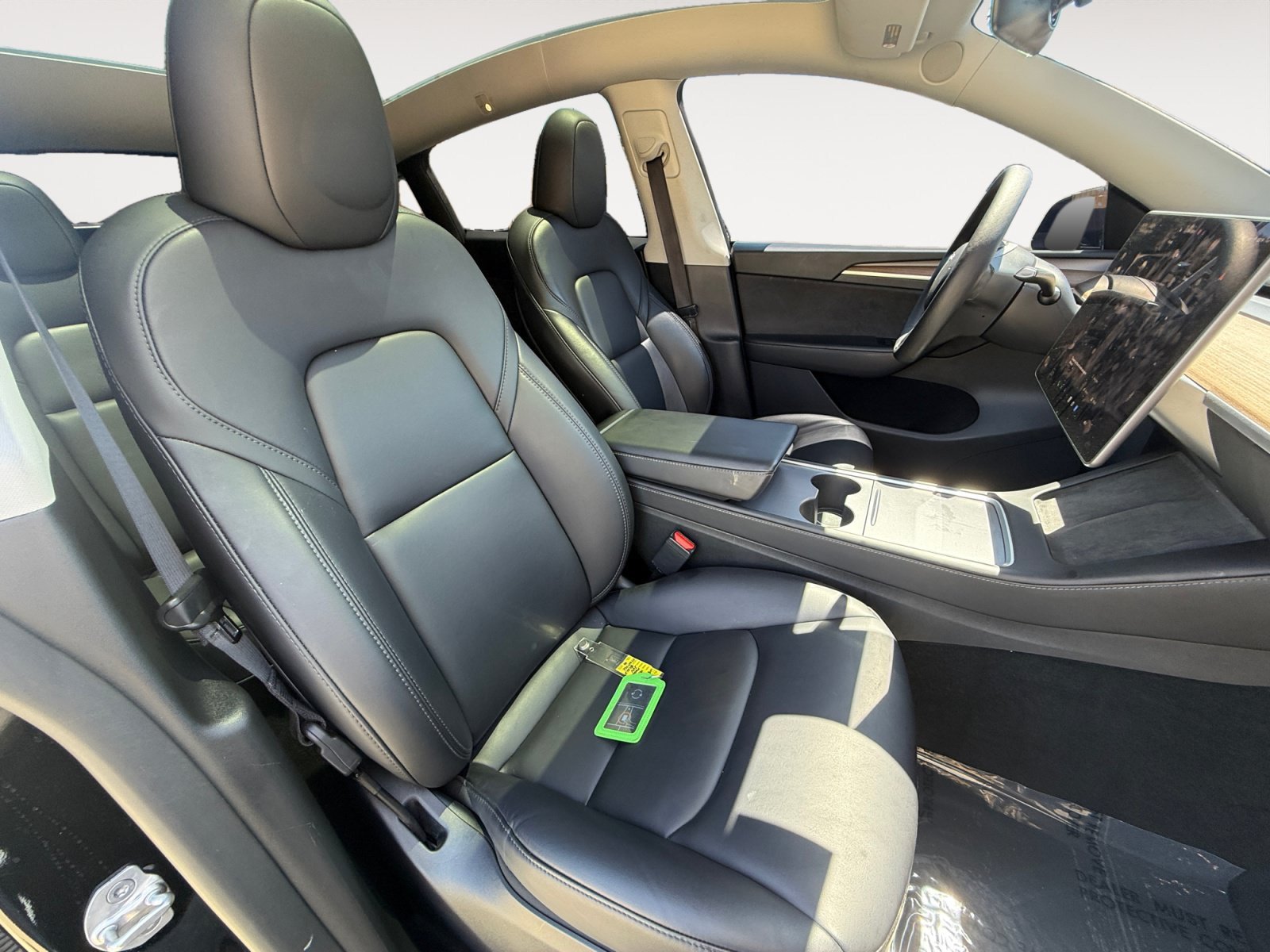 Used 2024 Solid Black Tesla Performance image 19
