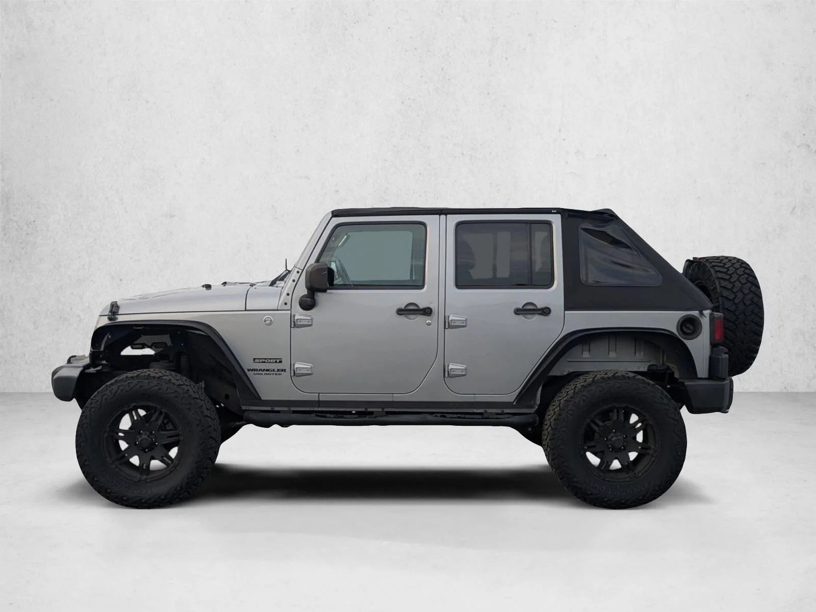 Used 2014 Billet Metallic Clearcoat Jeep Sport image 8