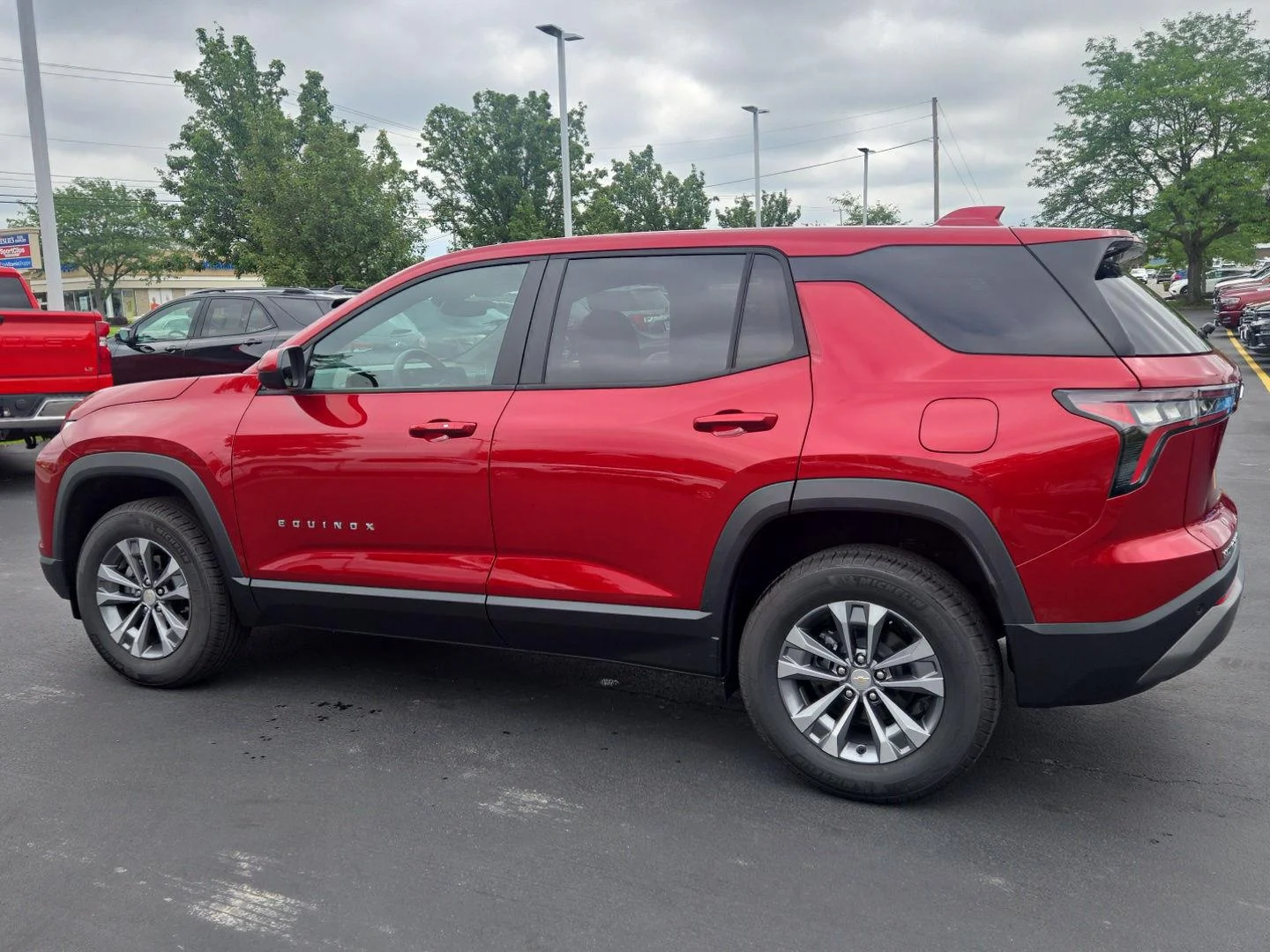 Used 2026 Radiant Red Tintcoat Chevrolet AWD LT image 2