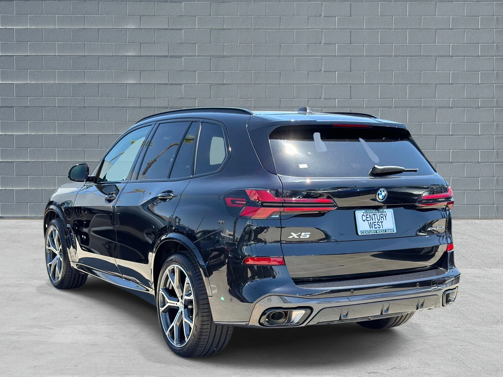 New 2026 Black Sapphire Metallic BMW xDrive50e image 3