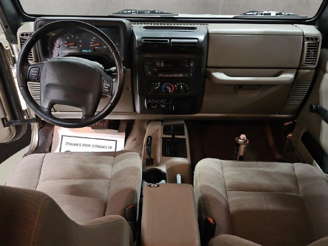 Used 2004 Beige Jeep Sport image 2
