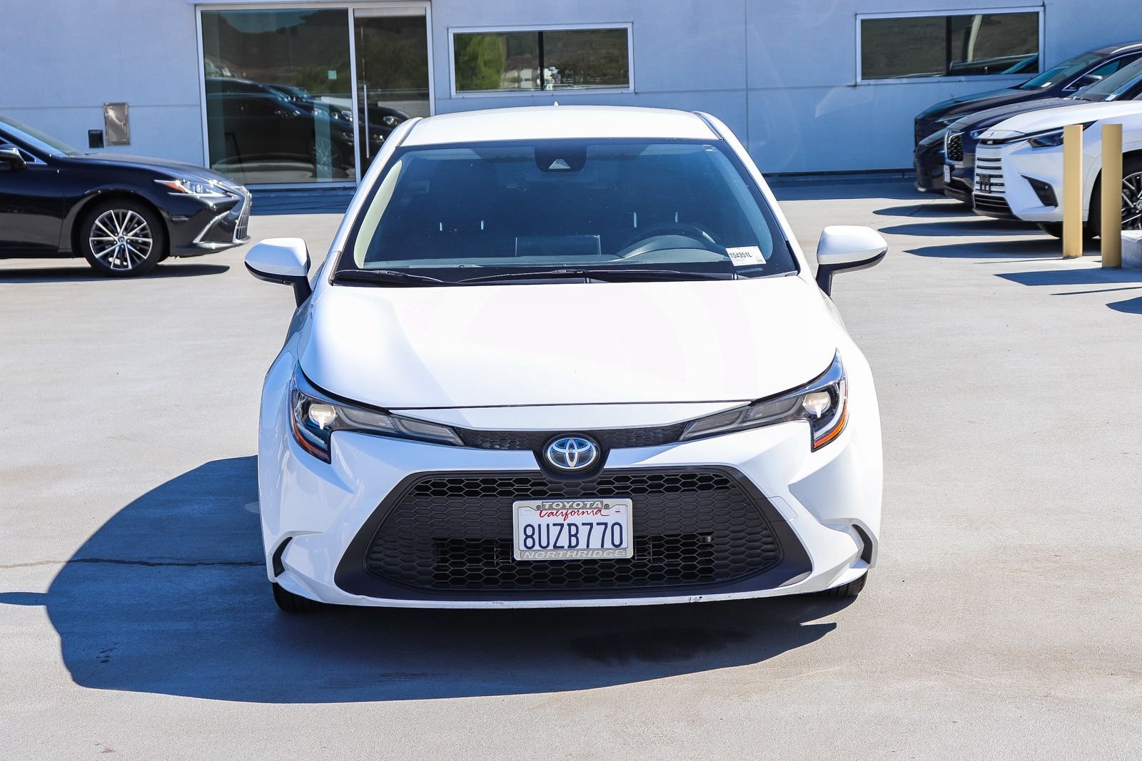 Used 2021 White Toyota LE image 2