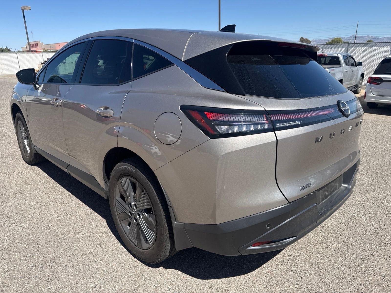 Used 2026 Champagne Silver Metallic Nissan SL image 3
