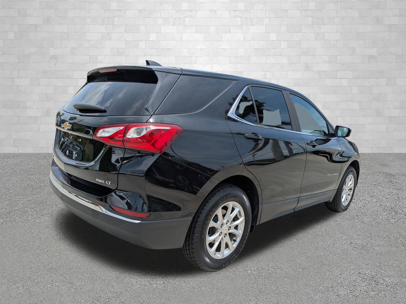 Used 2021 Chevrolet Equinox LT with VIN 2GNAXUEV2M6107275 for sale in Naples, FL