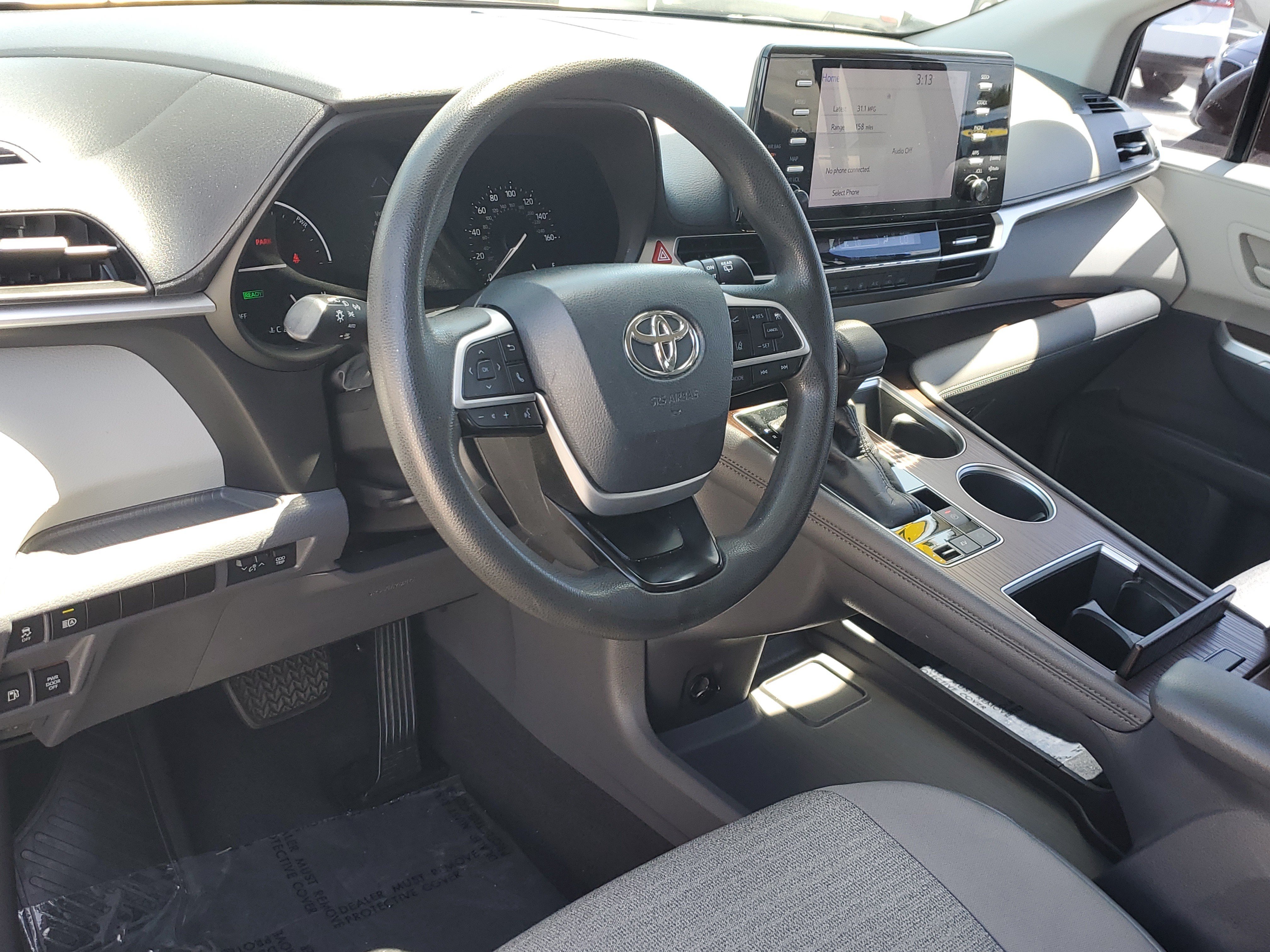 Used 2021 Sunset Bronze Toyota LE image 21