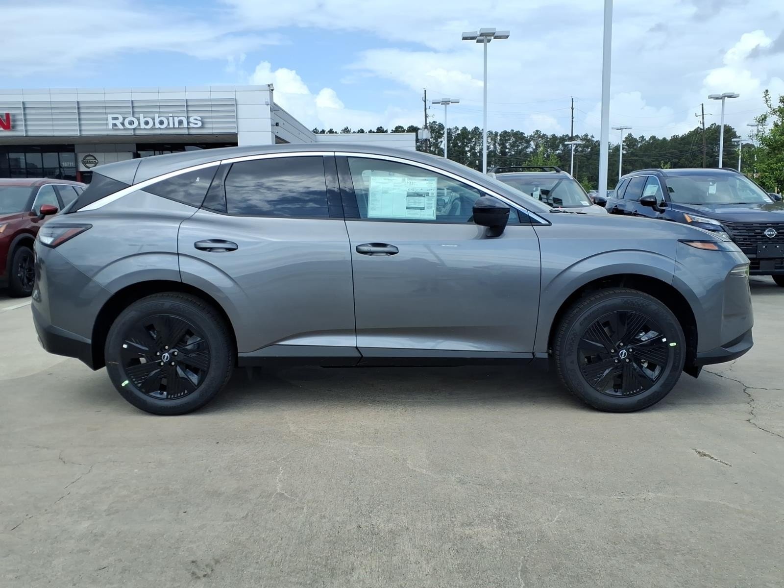 New 2026 Gun Metallic Nissan SV image 4