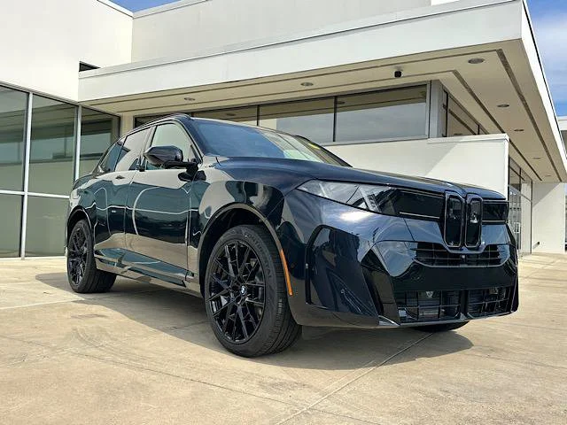 New 2027 Carbon Black Metallic BMW 40 xDrive image 1