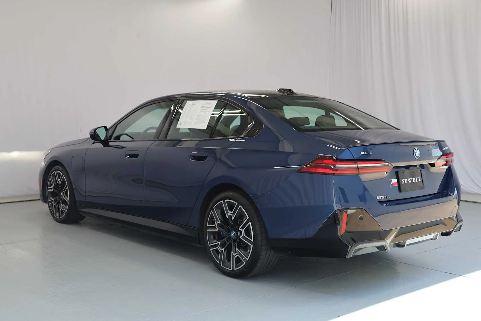 Certified Used 2025 Phytonic Blue Metallic BMW 550e xDrive image 8