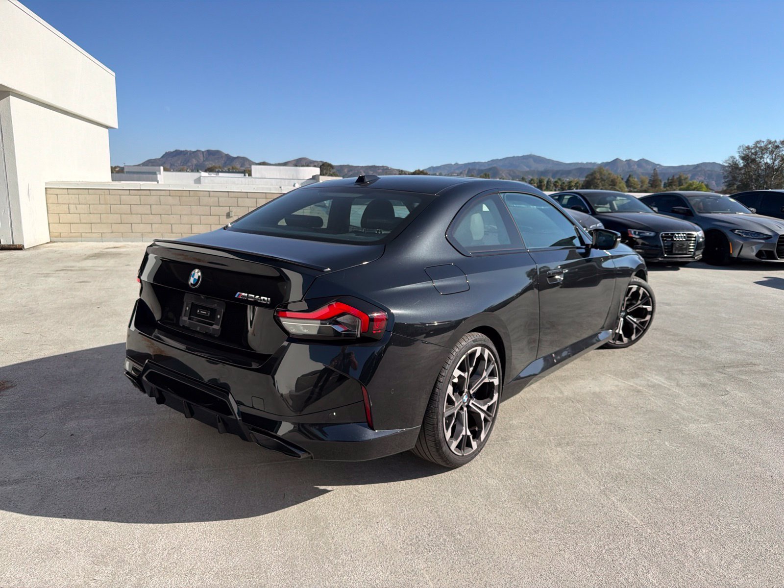 Used 2025 Black Sapphire Metallic BMW M240i image 4
