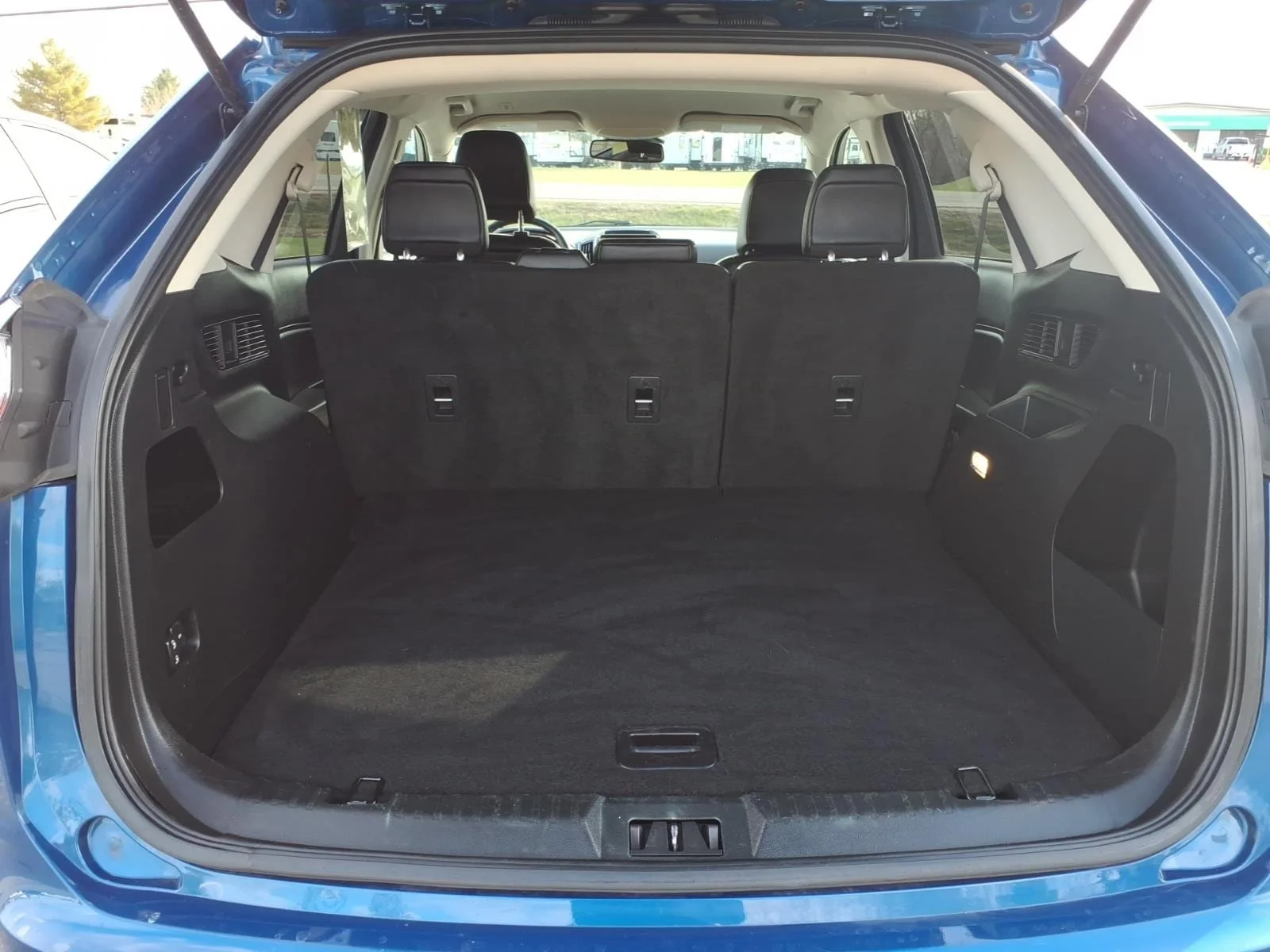 Used 2024 Blue Metallic Ford SEL image 12