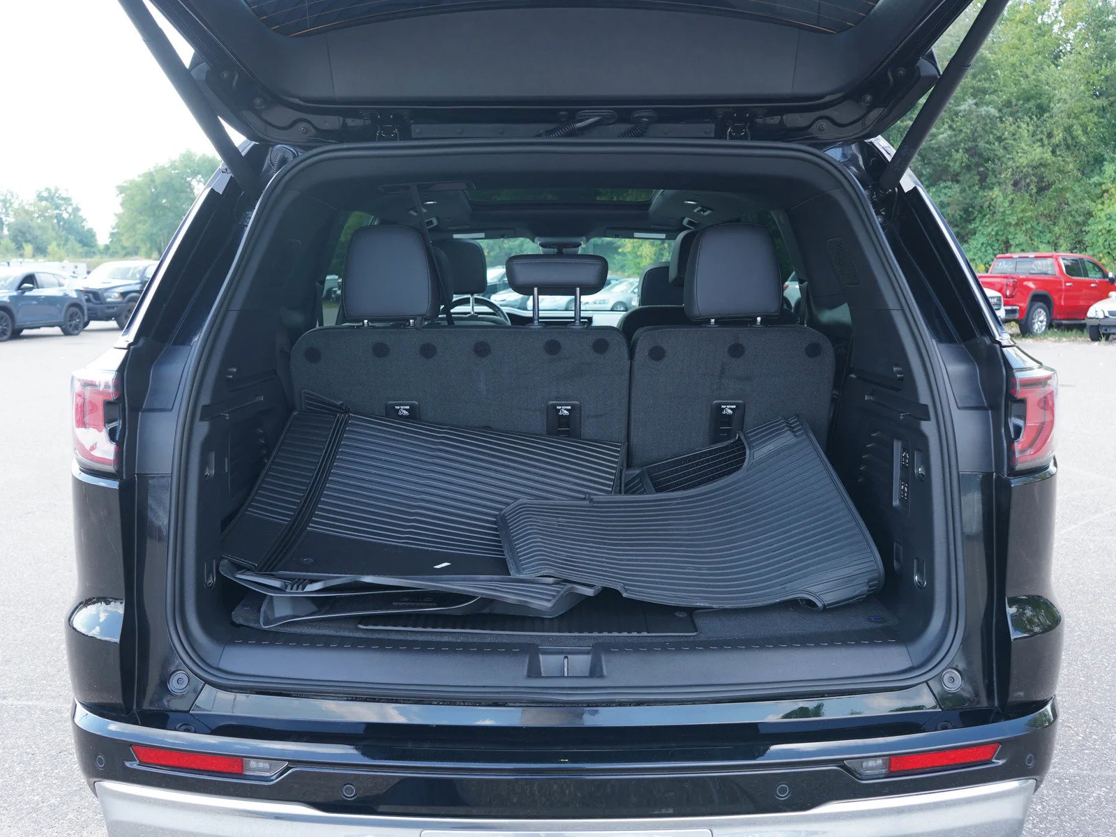 Used 2026 Ebony Twilight Metallic GMC Denali image 14