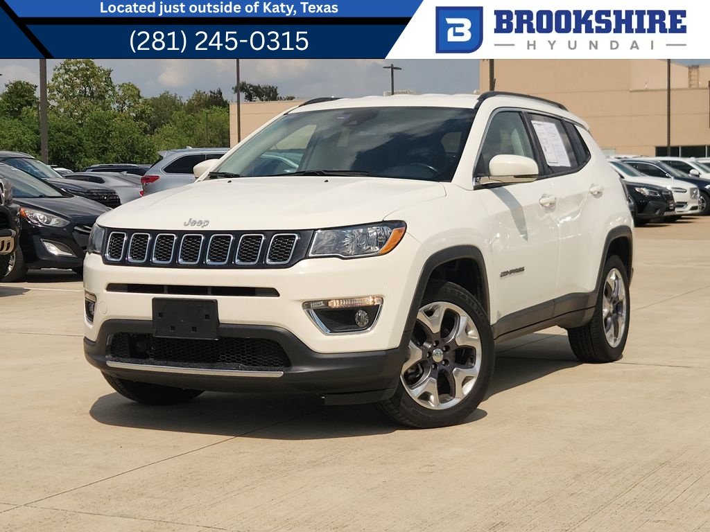 Used 2021 White Clearcoat Jeep Limited image 1