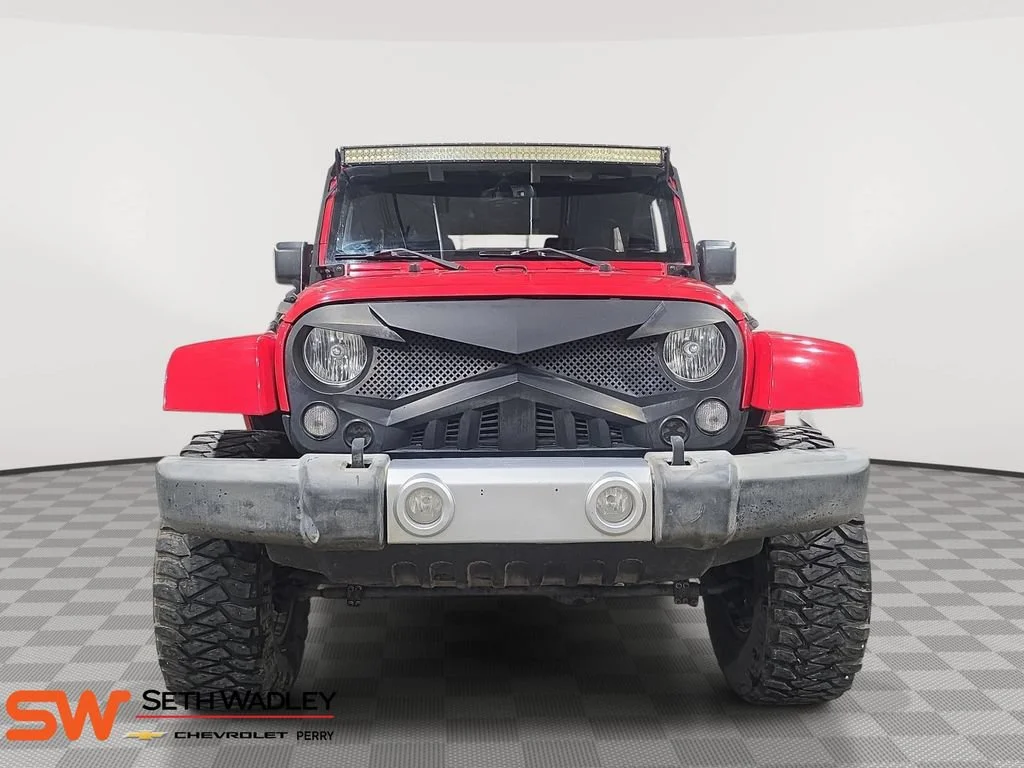 Used 2015 Red Jeep Sahara image 2