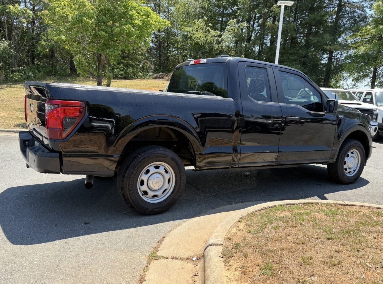 Used 2024 Agate Black Metallic Ford XL image 5