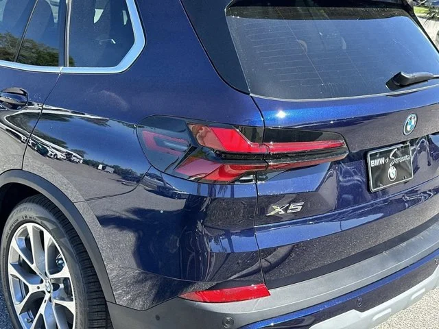 New 2026 Tanzanite Blue II Metallic BMW xDrive50e image 9