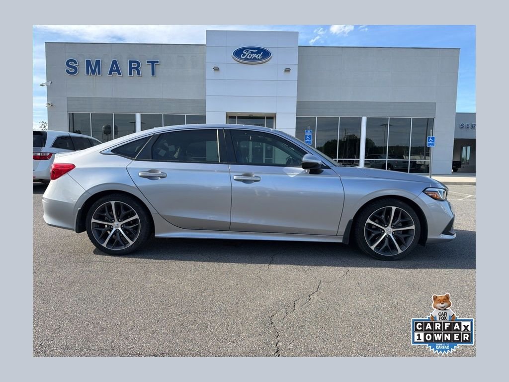 Used 2024 Lunar Silver Metallic Honda Touring image 1