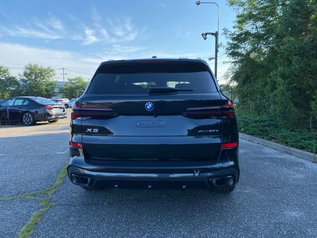 New 2026 Black Sapphire Metallic BMW xDrive50e image 3