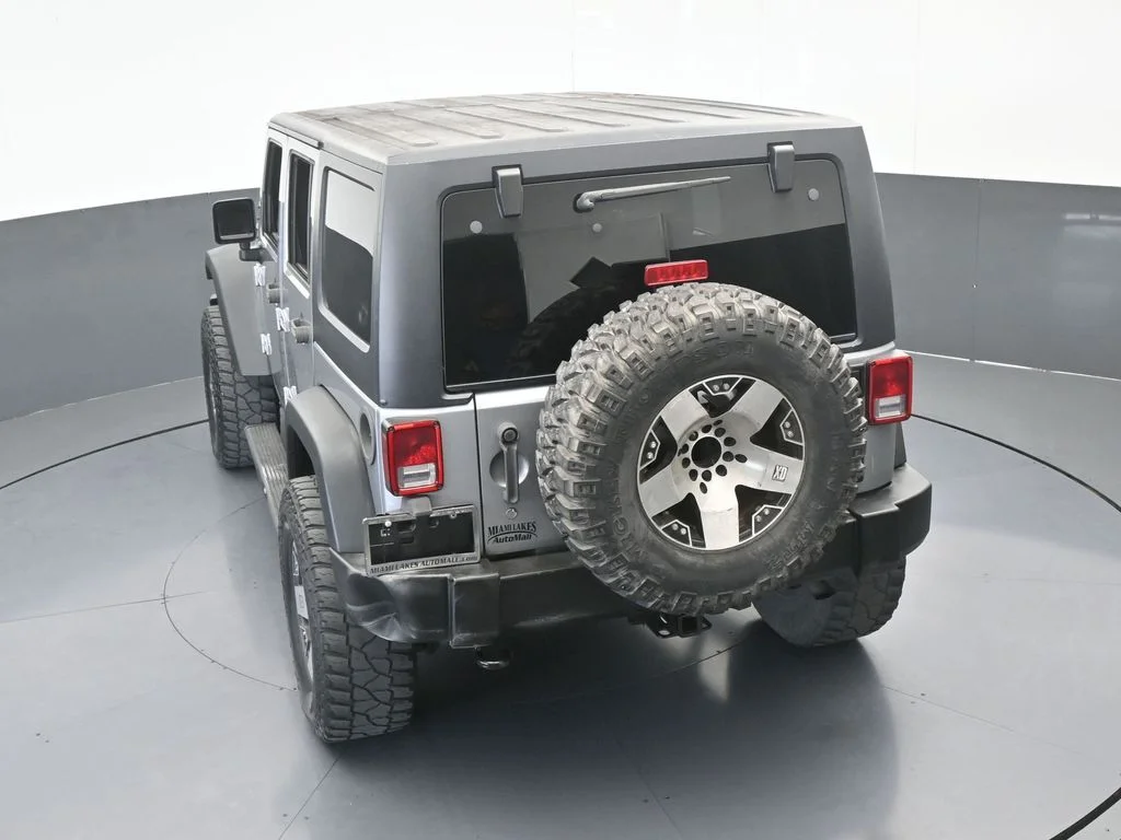 Used 2016 Billet Silver Metallic Clearcoat Jeep Unlimited Sport image 49